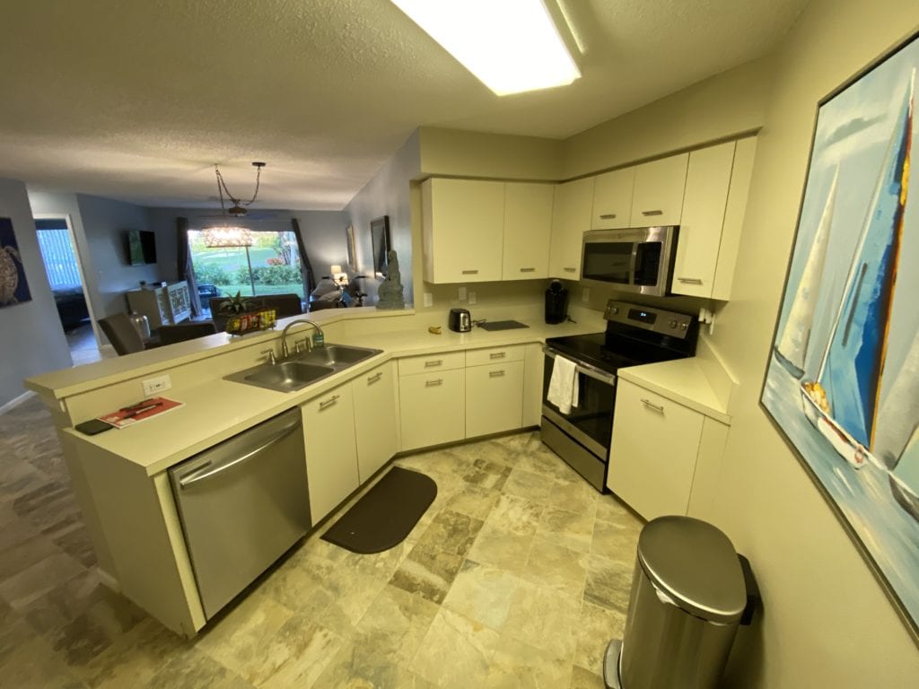 Updated kitchen with new appliances at Bahia 155 Vista Verde East condo