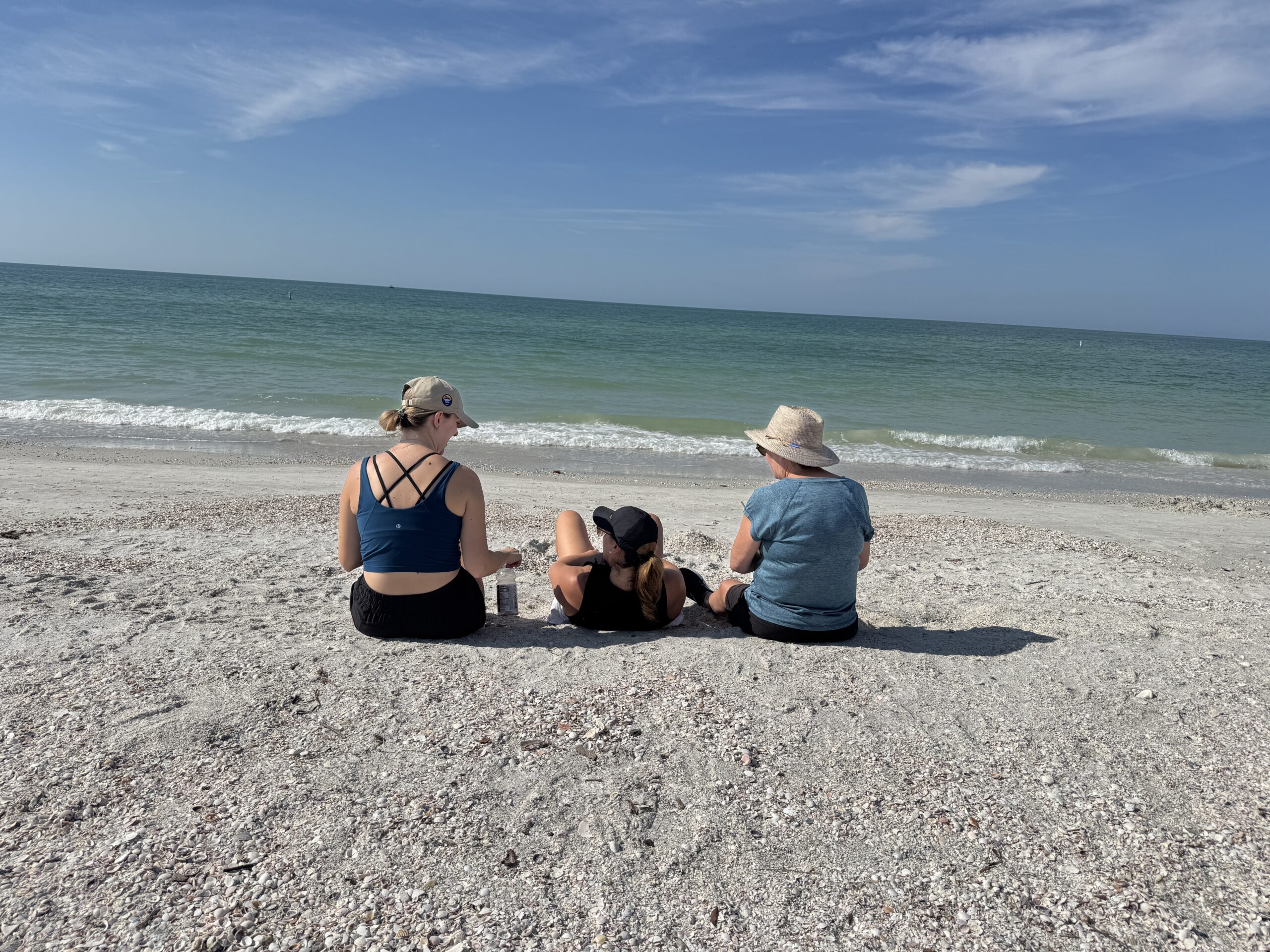Guests relaxing on St. Pete Beach near Bahia 155 vacation rental on Isla del Sol