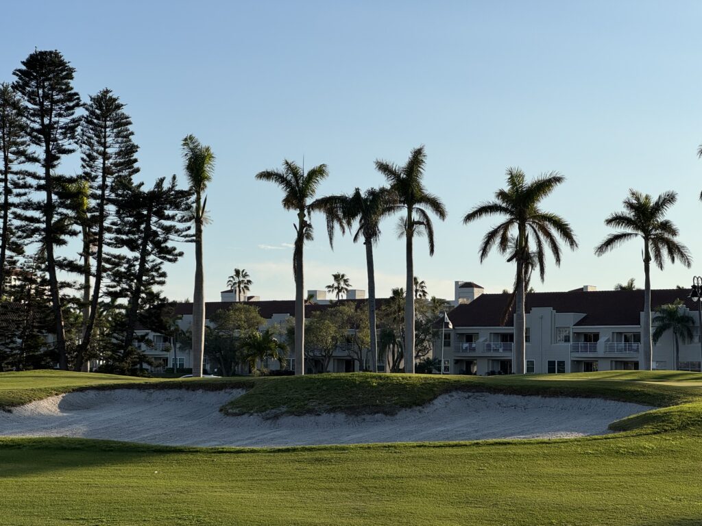 Isla del Sol waterfront property with palm trees and lush grounds at Bahia 155